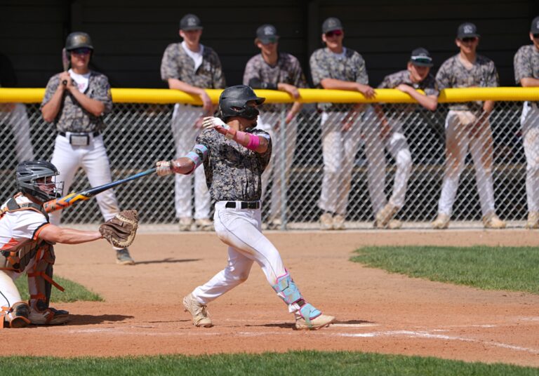 Aberdeen Smittys outfielder Jehiel Aviles follows through on a swing during the Smittys doubleheader with Huron Sunday, May 11 at Fossum Field. The Smittys won both games to qualify for the playoffs. Photo by Kevin Foss for the Aberdeen Insider.