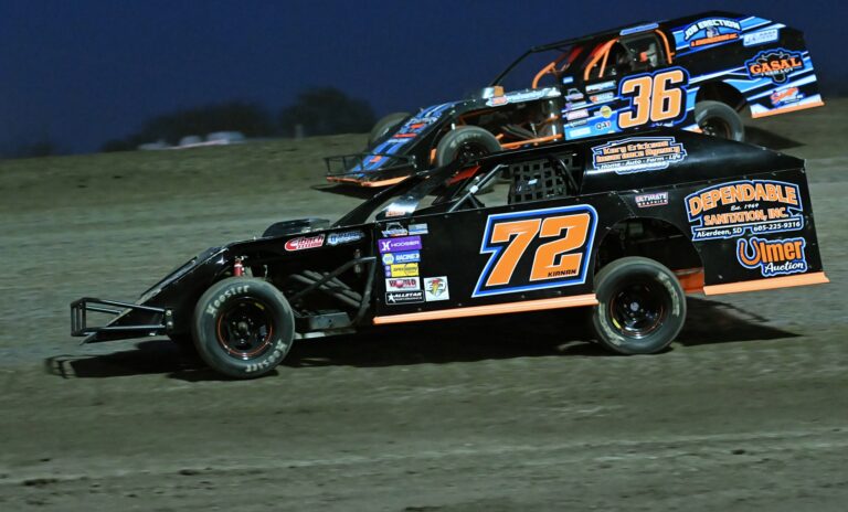 Aberdeen's Caden Kirnan goes low and tries to pass during the Midwest Mods feature Friday, May 2 at the Brown County Speedway. Kirnan finished 17th in the 25-car race. Aberdeen Insider photo by Robb Garofalo.