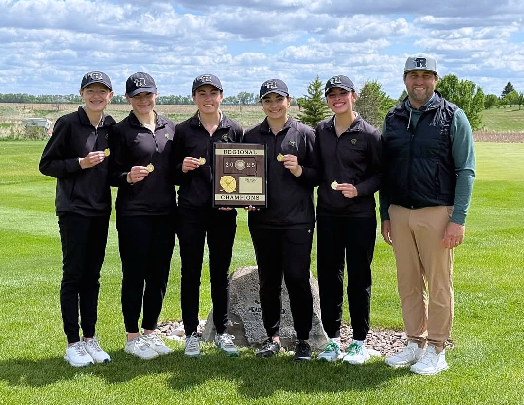 Aberdeen Roncalli's Mackenzie Wegehaupt, left, Morgan Helms, Claire Crawford, Ava Danielson, Grace Seyer and head coach John Murdy with the Region 1A championship plaque on Thursday, May 22 in Volga. It was the third straight region title for the Cavaliers. Courtesy photo.