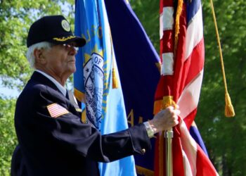 Larry Lightenburg with the American Legion color guard holds the U.S. flag during the Memorial Day ceremony at St. Mary's Cemetery on Monday, May 28. Aberdeen Insider photo by Scott Waltman.