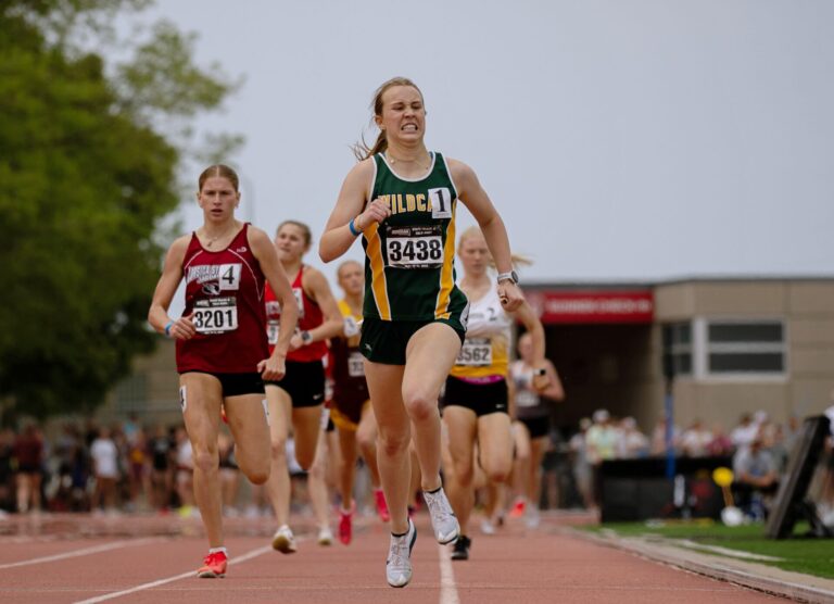 Northwestern's Ella Boekelheide holds off the competition down the stretch while winning the girls Class B 800-meter run Friday, May 30 at the state track meet in Sioux Falls. Photo courtesy of South Dakota Public Broadcasting.