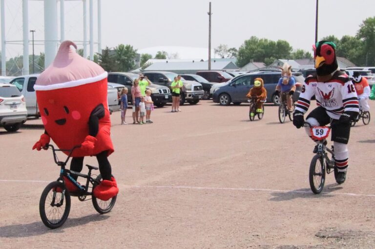 Several Hub City mascots participated in a short-distance bike race on Sunday, June 1 as part of the Get Pumped Bike-a-thon and Family Festival with the Wendy's Frosty taking an early lead and securing victory with Winger from the Aberdeen Wings coming in second. Aberdeen Insider photo by Elisa Sand.