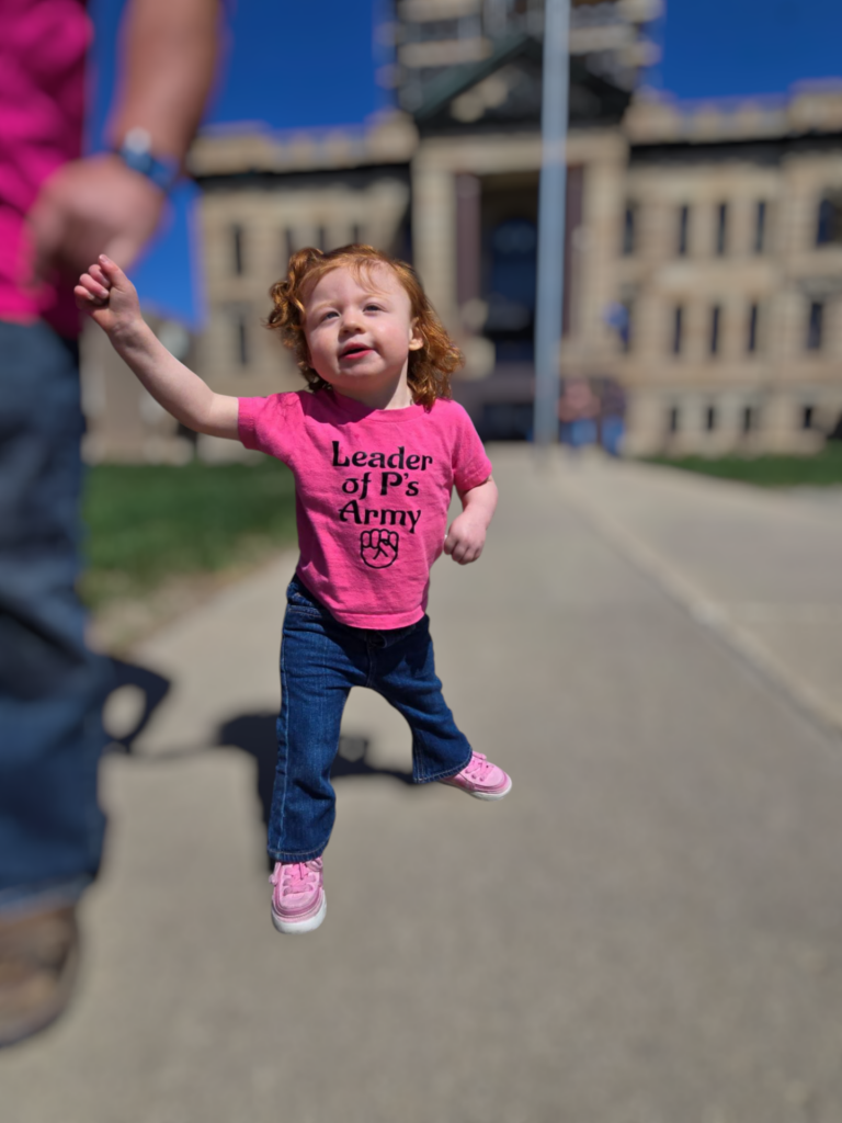 Presleigh Mills walks away out the Brown County Courthouse in Aberdeen the sentencing of Whyatt Kessler, who pleaded guilty to assaulting the now 3-year-old girl. Courtesy photo.