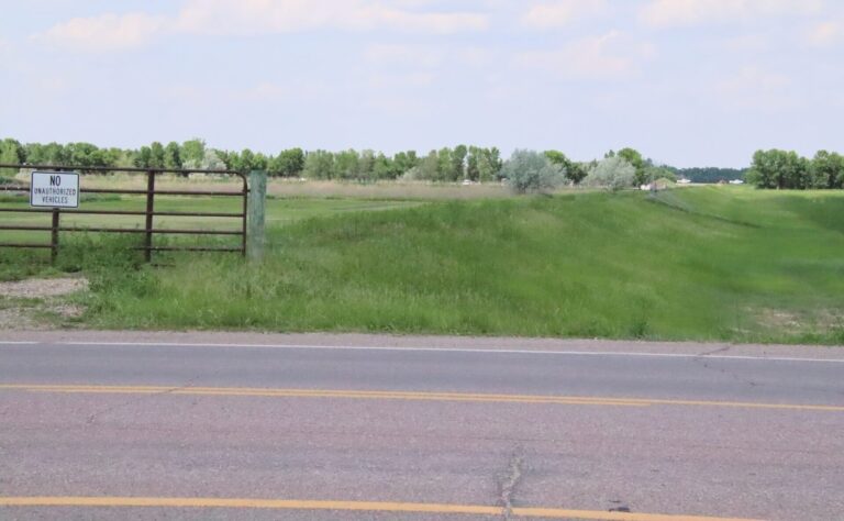 Portions of the flood control levee are visible on either side of Eighth Avenue Northeast near Carlsen's Funeral Home. Aberdeen Insider photo by Elisa Sand.
