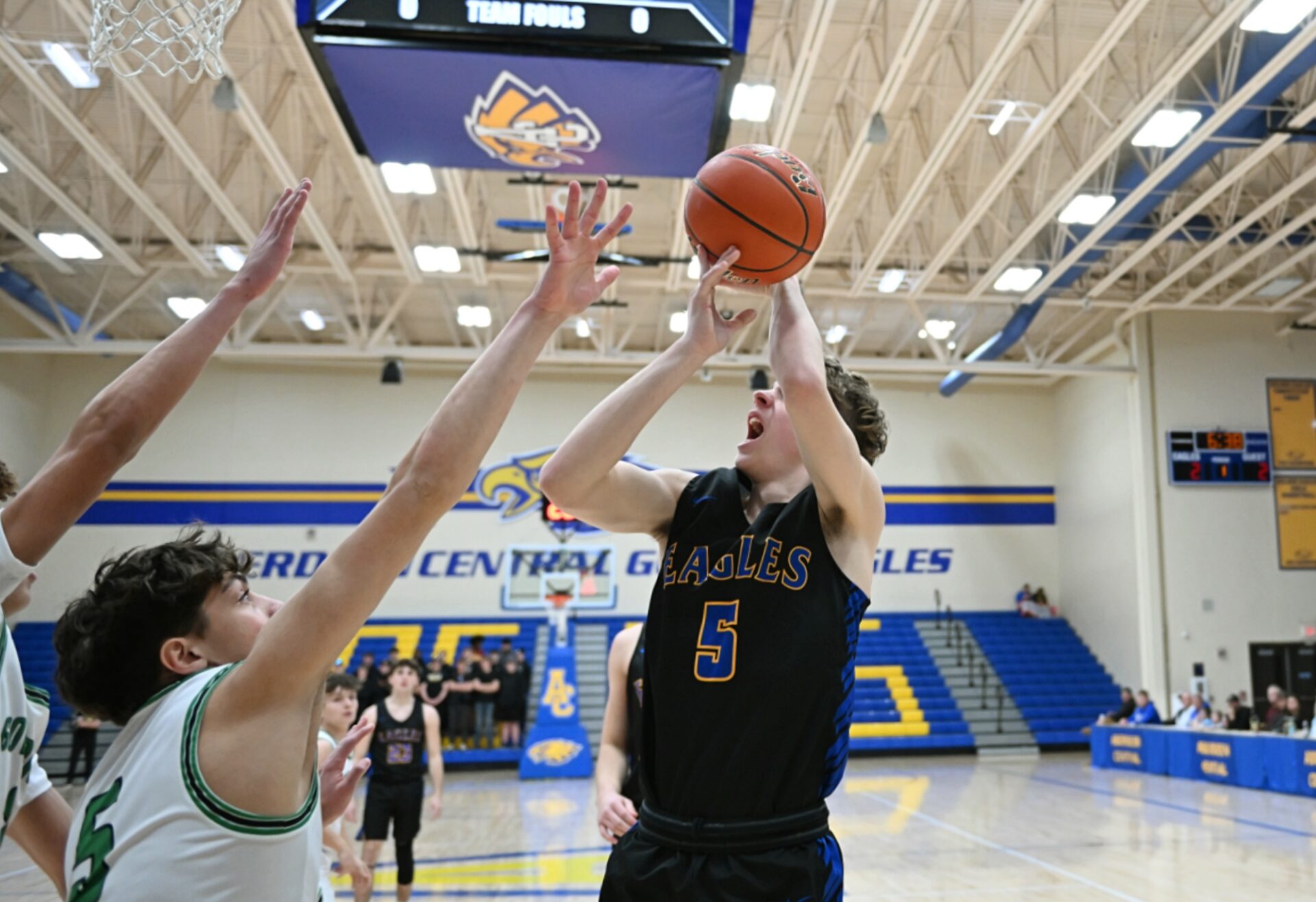 Brendan Phillips grabs an offensive rebound for Aberdeen Central during a game against Pierre Jan. 28 at Golden Eagles Arena. Phillips has committed to play college basketball at Northern State. Aberdeen Insider photo by Robb Garofalo.