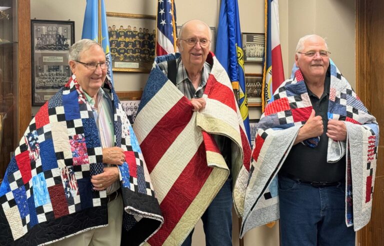 Aberdeen veterans, from left, Roger Schmidt, Jerry Hoven and Jerold Gehring received Quilts of Valor on Wednesday, June 18. Aberdeen Insider photo by Elisa Sand.