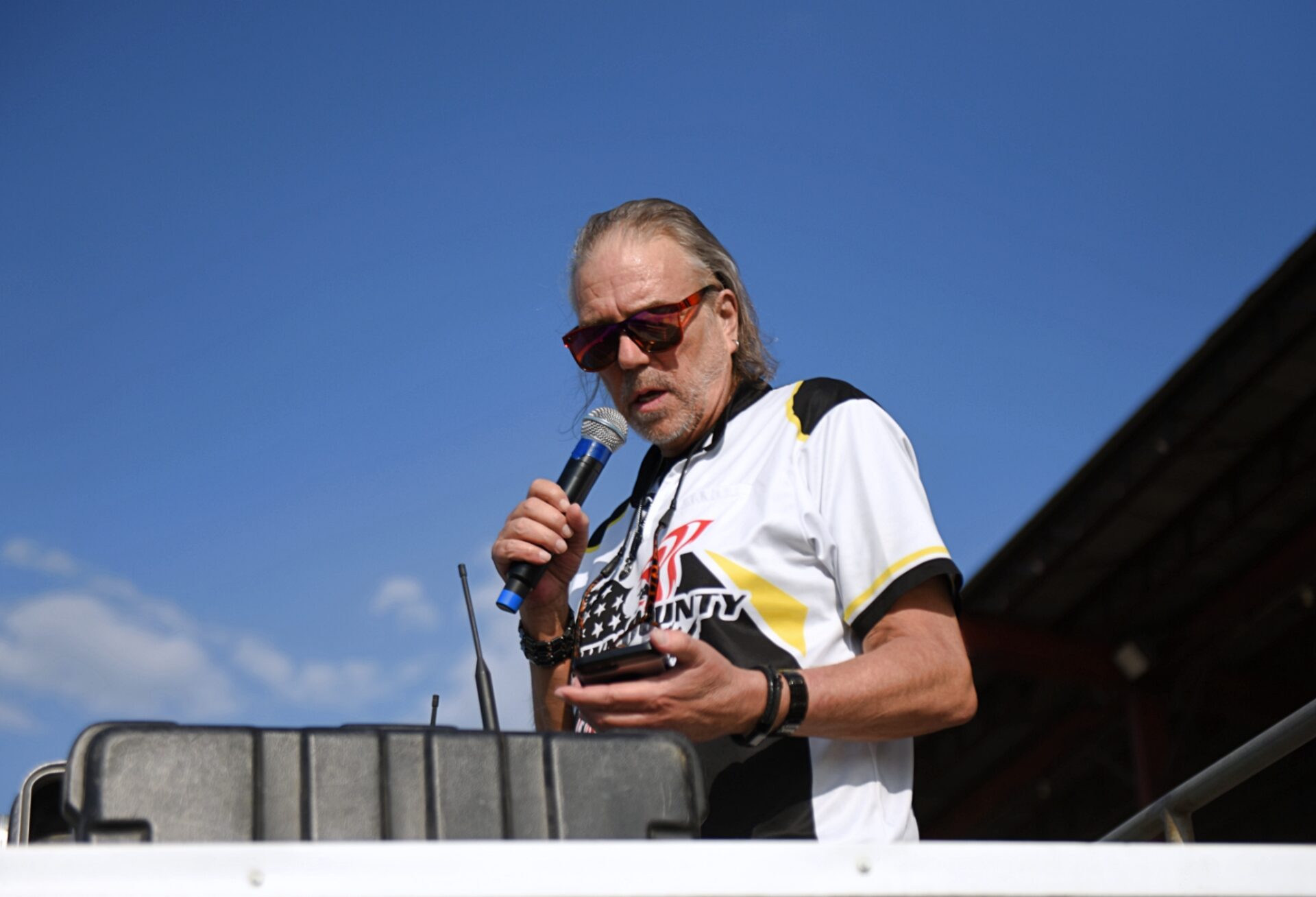 Jay Kleinknecht goes over the racing lineup Friday, June 20 at Brown County Speedway. It was his first night at the track after months of serious medical challenges. Aberdeen Insider photo by Robb Garofalo.