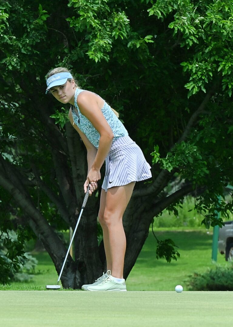 Olivia Braun tracks her putt on the 12th hole during the South Dakota Golf Association Sanford Series junior event at Moccasin Creek Monday, June 30. Braun won the tournament. Aberdeen Insider photo by Robb Garofalo.