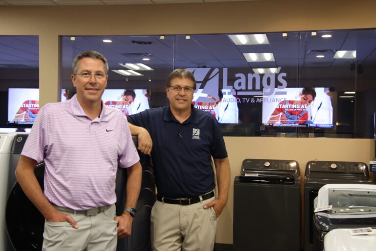 Brothers Chad and Paul Lang, owners of Lang's Audio, TV & Appliance, are celebrating 50 years in business this year. Aberdeen Insider photo by Shannon Marvel.