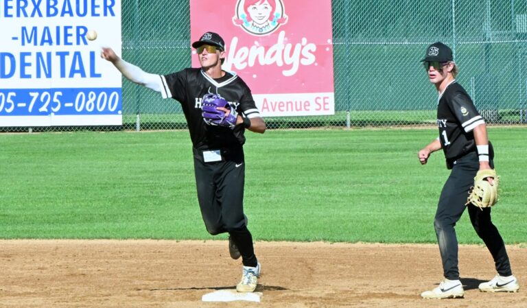 Aberdeen Smittys shortstop Grant Beyer steps on second and throws to first to complete a double play Tuesday, July 8 at Fossum Field. The Smittys split a doubleheader with Sioux Falls East, taking game one 15-9 before falling 18-3 in game two. Aberdeen Insider photo by Robb Garofalo.