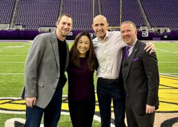 Aberdeen native Skip Krueger, third from left, is the director of broadcasting and original content for the Minnesota Vikings. With him on the field at U.S. Bank Stadium are coworkers Allan Wertheimer, senior director of production operations and game presentation, left; Heather Larsen, senior director of digital marketing and content strategy; and Bryan Harper, vice president of content and production. Courtesy photo.