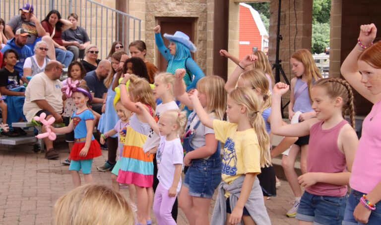 Kids leaned some line-dancing moves as the Dollipops preformed on Saturday, June 19 at the Storybook Land Festival at Wylie Park. Aberdeen Insider photo by Elisa Sand.