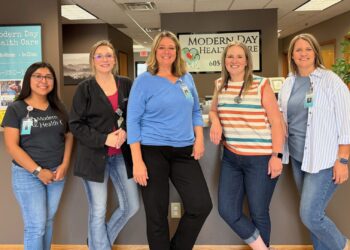 Annie Donaway, center, CEO of Modern Day Health Care, stands with some of the staff and providers at the Aberdeen clinic. Joining her are, from left, receptionist Britney Gonzalez, registered nurse Libbie Leller and nurse practitioners Jenna Braun and Angie Gaikowski. Aberdeen Insider photo by Elisa Sand.