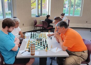Local chess clubs organize tournaments in hopes of developing top-end players 5 Chess players compete during a July 3 tournament in Aberdeen. Two local chess groups plan to schedule a series of tournaments giving players a chance to improve their game. Courtesy photo.