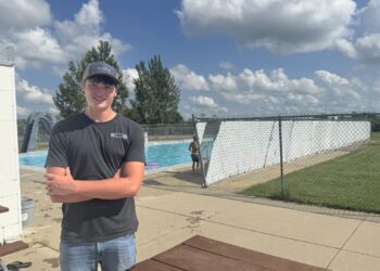 Leola High School senior and Boy Scout Troop 188 member Grant Anderson is building a pergola at the Leola city pool to provide shade for patrons. Aberdeen Insider photo by Shannon Marvel.