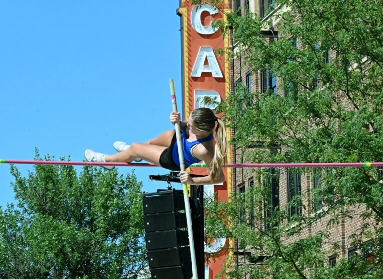 Aberdeen Central's Jaidyn Forsyth clears the bar during the Hub City Street Vault event Thursday, July 24 on Main Street in Aberdeen. Aberdeen Insider photo by Robb Garofalo.