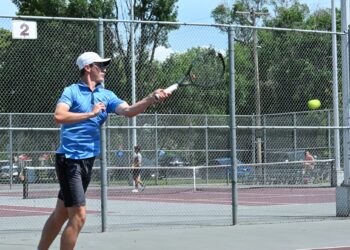 Familiar faces team up on tennis courts during Hub City Open 5 Aberdeen's Gannon May hits a forehand during his singles match in the Hub City Open tennis tournament Friday, July 25 at the Northern State courts. Aberdeen Insider photo by Robb Garofalo.