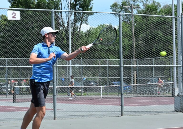 Aberdeen's Gannon May hits a forehand during his singles match in the Hub City Open tennis tournament Friday, July 25 at the Northern State courts. Aberdeen Insider photo by Robb Garofalo.