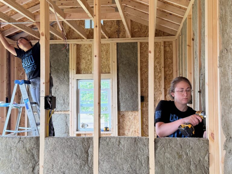 Gabbie Vilanova, left, and Sabrina Smith work on building out an animal shelter at Safe Harbor in Aberdeen on Sunday, Aug. 10. Aberdeen Insider photo by Elisa Sand.