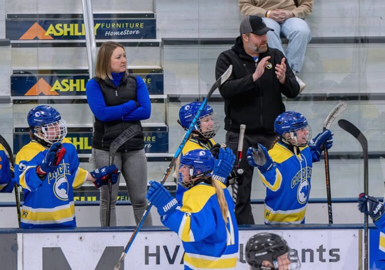 Amy Munsterman-Willis, left, moves from assistant to head coach of the Aberdeen Cougars girls varsity hockey team. Courtesy photo.
