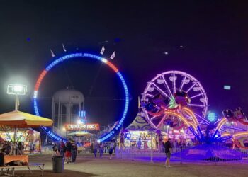 The midway carnival lights up the nighttime sky on Tuesday, Aug. 12 at the Brown County Fair. Aberdeen Insider photo by Elisa Sand.