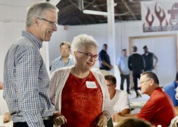 U.S. Sen. John Thune, R-S.D., visits with Lois Bieber before an agriculture roundtable discussion at the Brown County Fair on Friday, Aug. 15. Aberdeen Insider photo by Scott Waltman.