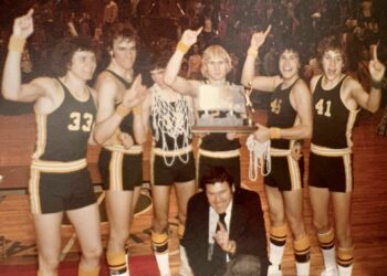 Tom Dix, Kent Clausen, Tim Roby, Cary Hornaman, Harley Zephier and Mark Graeber were members of the Roncalli High School basketball team that, 50 years ago, won the Class A state basketball tournament. In front is head coach Francis Zacher. Courtesy photo.