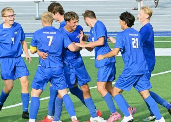 Derek Arunasalam, center, celebrates with his teammates following his goal late in the first half against Pierre on Friday, Aug. 15 at the Brownell Activities Complex. Aberdeen Insider photo by Robb Garofalo.