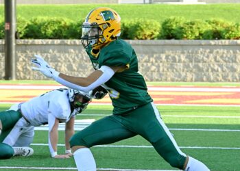 Aberdeen Roncalli's Will Haskell cuts back during a run Friday, Aug. 22 against Clark/Willow Lake at Dacotah Bank Stadium. Roncalli lost its season opener 38-0. Aberdeen Insider photo by Robb Garofalo.