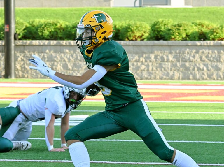 Aberdeen Roncalli's Will Haskell cuts back during a run Friday, Aug. 22 against Clark/Willow Lake at Dacotah Bank Stadium. Roncalli lost its season opener 38-0. Aberdeen Insider photo by Robb Garofalo.