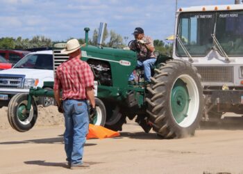 Les Merkel lifted up the front end of his Oliver tractor in the 7500 pound weight class. He finished third with a pull of 184.45 feet behind Bob Pots in second at 185.19 feet and Cory Bremmon in first at 191.44. The Brown County Old Time Tractor Pullers Association held their fair tractor pull on Saturday, Aug. 23. It had been rescheduled due to muddy conditions during the fair. Aberdeen Insider photo by Elisa Sand.