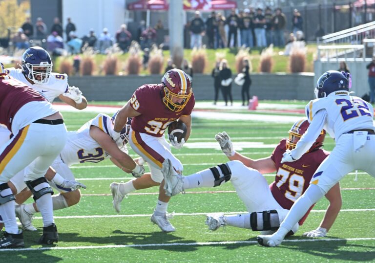 Northern State running back Wyatt Block carries the ball against Minnesota State on Saturday, Nov. 2, 2025 at Dacotah Bank Stadium. Aberdeen Insider photo by Robb Garofalo.