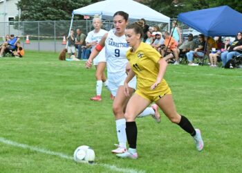 Groton Area's Jerica Locke beats Garretson's Taylor Schmidt to the ball during the first half of their game Thursday, Aug. 28 in Groton. Locke scored her 10th goal of the year in a 4-1 win. Aberdeen Insider photo by Robb Garofalo.