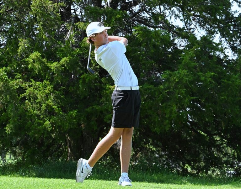 Aberdeen Roncalli's Harper Schnabel tracks his tee shot during the Hub City Invitational Tuesday, Sept.2 at Lee Park Golf Course. Aberdeen Insider photo by Allie Hoekman.