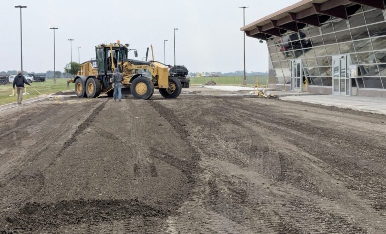 Work continues to resurface the primary access road and parking lot at Aberdeen Regional Airport. Aberdeen Insider photo by Scott Waltman.