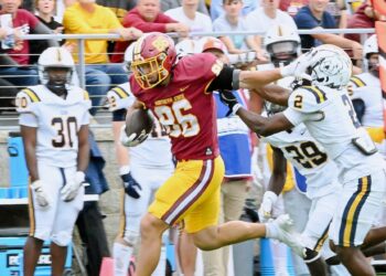Northern State's Zach Kraft stiff-arms Concordia-St. Paul's Hudson Jean en route to a 46-yard touchdown during the third quarter Saturday, Sept. 20 inside Dacotah Bank Stadium. Kraft had four catches for 70 yards in a 31-10 win. Aberdeen Insider photo by Robb Garofalo.