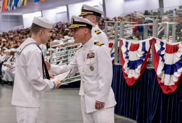 Jackson Rott, left, an Aberdeen native, recently received the Academic Excellence Award from the U.S. Navy Recruit Training Command. Presenting Rott the honor is Capt. Richard Prescott, executive officer of the USS John C. Stennis. Photo courtesy of Navy Recruit Training Command.