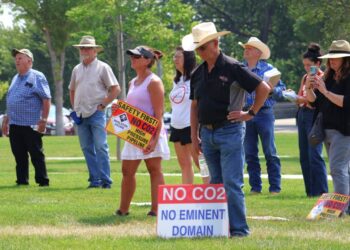 Protesters gather at the North Dakota Capitol in Bismarck to voice opposition to the Summit Carbon Solutions carbon sequestration pipeline on July 27, 2024. (Photo by Michael Achterling/North Dakota Monitor)