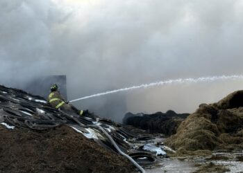 Firefighters work to extinguish a fire at Warner Dairy on Tuesday, Sept. 30. Photo courtesy of Warner Volunteer Fire Department.