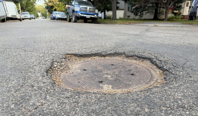 The city has been setting aside money for the past five years for manhole rehabilitation, though much has been redirected to other projects. The goal is to make manhole covers level with street surfaces. Aberdeen Insider photo by Elisa Sand.