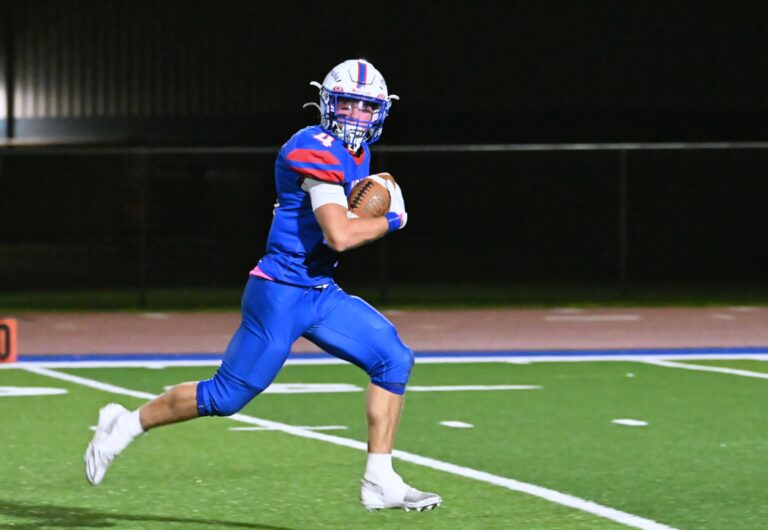 Warner's Jesiah Baum scores on a 63-yard touchdown pass during a 43-6 victory over North Central Friday, Oct. 10 at BankNorth/Dial-A-Move Field. Aberdeen Insider photo by Robb Garofalo.