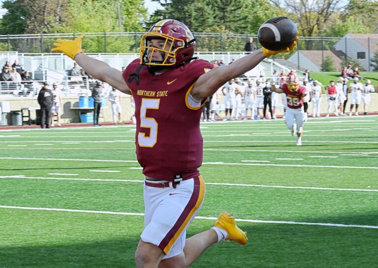 Northern State's Carter Campbell celebrates his 29-yard touchdown pass from Brock Bagozzi in the first quarter of the Wolves 55-23 win over Southwest Minnesota State Saturday, Oct. 18 at Dacotah Bank Stadium. Aberdeen Insider photo by Robb Garofalo.