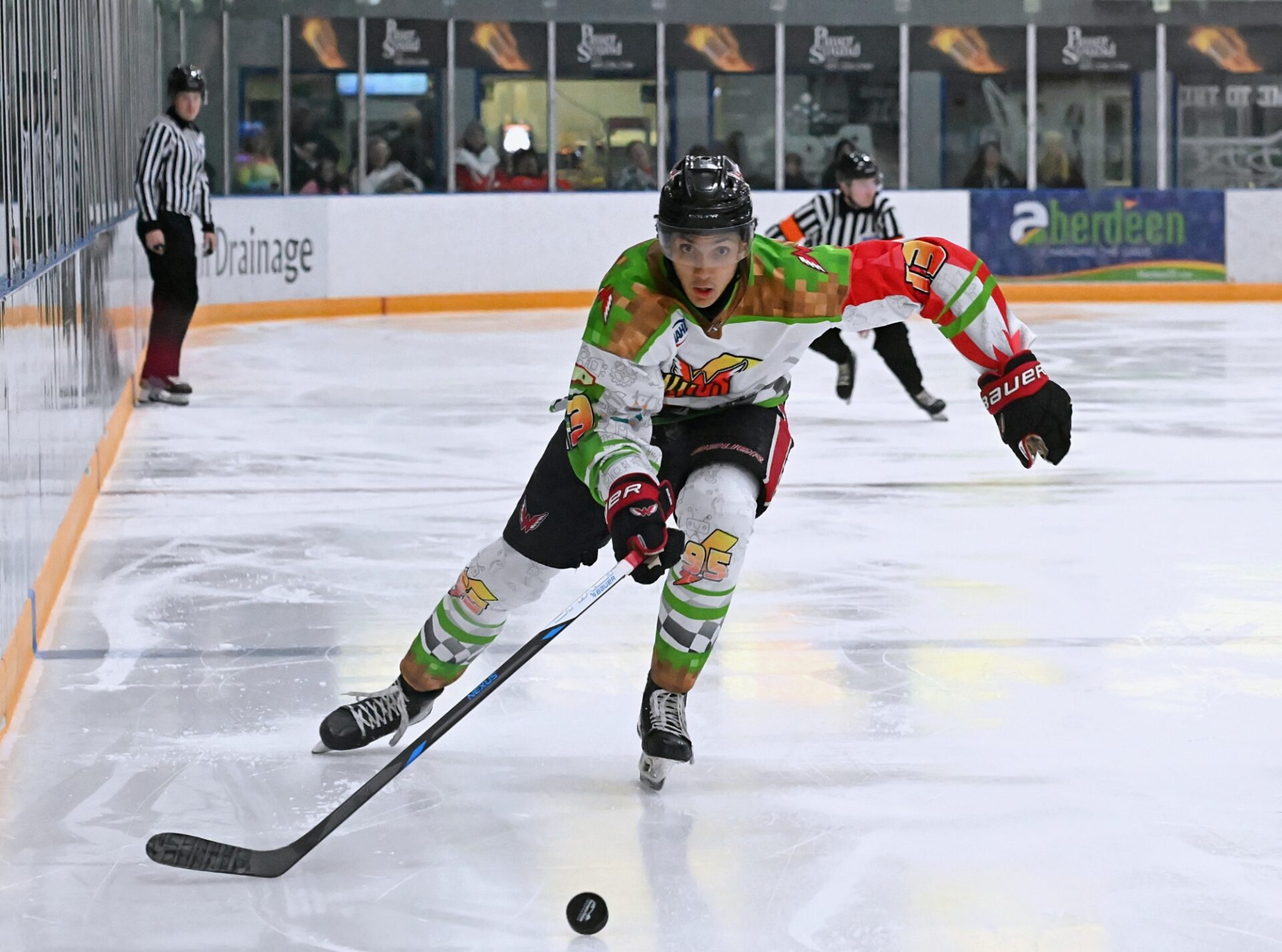 Aberdeen Wings forward Matthew Martin chases the puck during the third period against the Bismarck Bobcats Saturday, Nov. 1 at the Odde Ice Center. Martin scored the game-winning goal in a 3-1 win. Aberdeen Insider photo by Robb Garofalo.