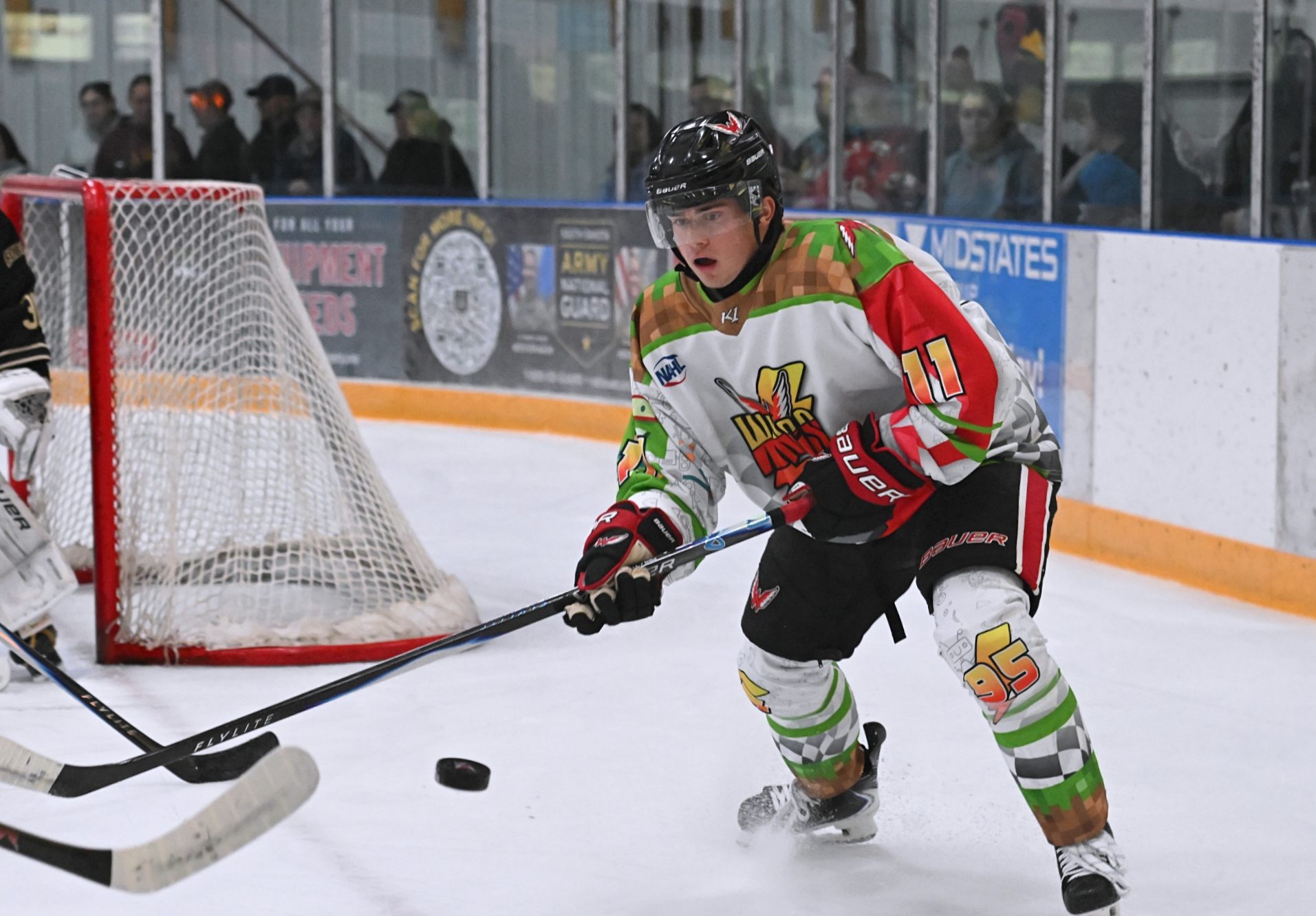 Aberdeen forward Tevan James eyes the puck on a faceoff during the first period against Bismarck Saturday, Nov. 1 at the Odde Ice Center. James scored a second-period goal in a 3-1 Wings win. Aberdeen Insider photo by Robb Garofalo.
