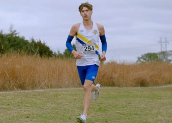 Warner's Cody Larson competes for South Dakota State in The Summit League Cross-Country Championships Saturday, Nov. 1 in Ashland, Neb. Larson won the race, helping the Jackrabbits to their 10th-straight conference championship. Courtesy photo.