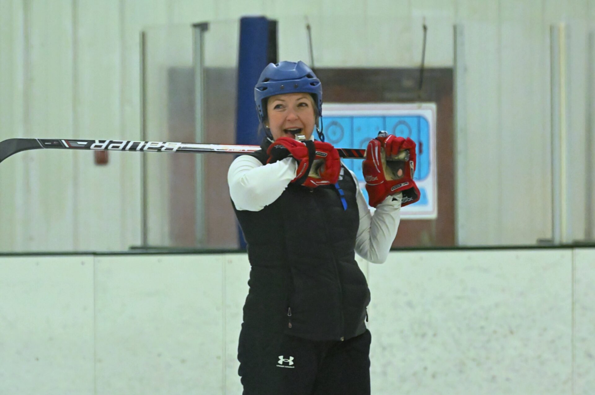 Aberdeen Cougars girls hockey head coach Amy Munsterman-Wills starts a line drill on Monday, Nov. 17 in the Hollum Expo Building. The girls squad opens its 2025-26 season on the road Saturday, Nov. 22 in Jamestown, N.D. Aberdeen Insider photo by Robb Garofalo.