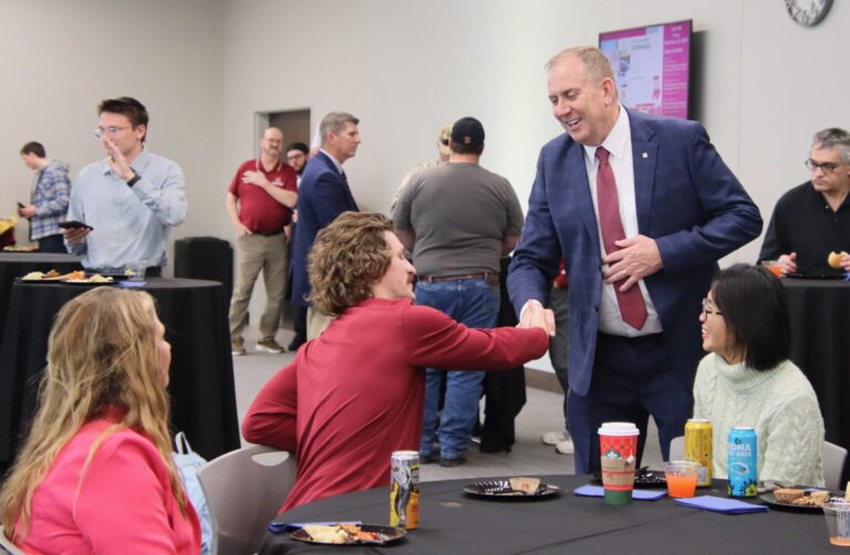 Alan LaFave, incoming president at Northern State University, mingles with visitors at an open house on campus Friday, Nov. 21 at the Kessler's Champions Club. Aberdeen Insider photo by Elisa Sand.