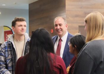 Alan LaFave, incoming president at Northern State University, mingles with students during an open house on campus Friday, Nov. 21 at the Kessler's Champions Club at the Barnett Center. Aberdeen Insider photo by Elisa Sand.