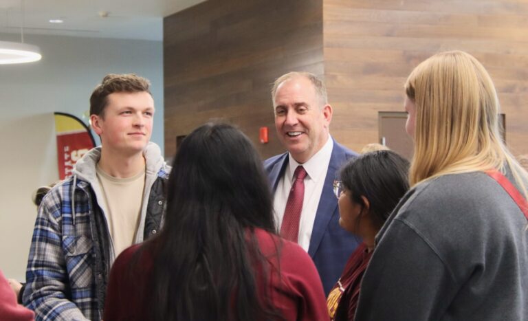Alan LaFave, incoming president at Northern State University, mingles with students during an open house on campus Friday, Nov. 21 at the Kessler's Champions Club at the Barnett Center. Aberdeen Insider photo by Elisa Sand.
