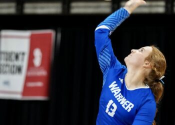 Warner senior Reagan Wood serves against Chester in the state championship match at the Class B high school volleyball tournament on Saturday, Nov. 22 in Rapid City. Chester won 3-0 to claim the state title as the Monarchs finished second. Photo courtesy of South Dakota Public Broadcasting.